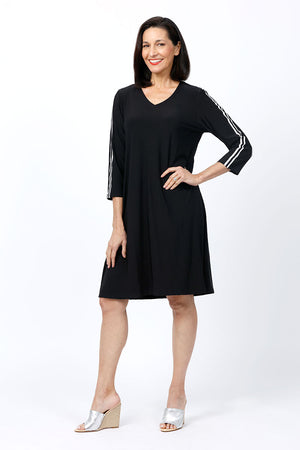 O.U.R.S. Stripe Detail Dress in Black.  V neck 3/4 sleeve dress with white racking stripes down center sleeve.  2 in seam pockets.  A line shape.  Relaxed fit._34815425249480