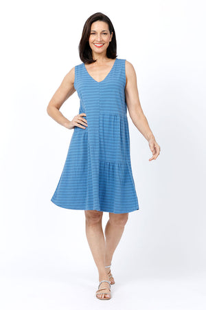 Organic Rags Stripe Tank Patch Dress in Navy. Light blue and navy stripes. V neck sleeveless dress with front asymmetric patchwork of gathered squares. Plain back with waist seam. Relaxed fit._34842979696840
