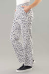 Lisette L Montreal Maridot Wide Leg Pant. Dark navy abstract dot print on a white textured background. 1 1/2" waistband pull on pant. Snug through stomach falls wide to hem. 2 side slash pockets. 29 1/2" inseam._t_34960146268360