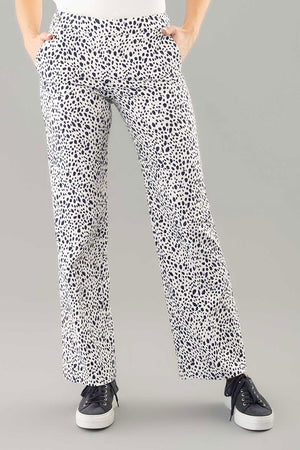 Lisette L Montreal Maridot Wide Leg Pant.  Dark navy abstract dot print on a white textured background.  1  1/2" waistband pull on pant.  Snug through stomach falls wide to hem.  2 side slash pockets.  29 1/2" inseam._34960146235592
