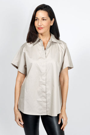 Planet Button Up Shirt in Fawn.  Pointed collar button down with hidden button placket.  Short dolman sleeve.  3 functional buttons at side seams.  Curved hem in front.  One size fits many_34953303326920