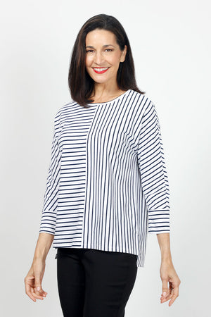 Top Ligne Striped Dolman Sleeve Top in White/Navy. Crew neck with banded neckline. 3/4 dolman sleeve with cuff. Horizontal stripes on 1 side of front and back; vertical on the other. Center seams. Relaxed fit._35020812484808