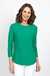 Ten Oh 8 Button Back Sweater in Green. Crew neck 3/4 sleeve horizontal textural rib. Curved hem. Braid trim at neck, hem and cuff. Button detail down center back. Relaxed fit._t_35432693203144