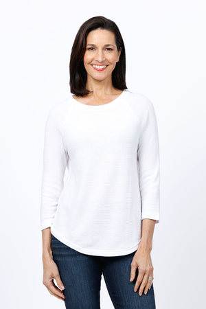 Ten Oh 8 Button Back Sweater in White. Crew neck 3/4 sleeve horizontal textural rib. Curved hem. Braid trim at neck, hem and cuff. Button detail down center back. Relaxed fit._34826715168968