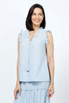 Organic Rags Washable Linen Striped Ruffle Trim Top in Denim and white stripes. V neck with ruffle collar and attached tassel ties. Sleeveless with ruffle trim. A line shape. Side slits. Relaxed fit._t_35181654474952