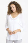 Wearables Mesh Fira Pullover in White. V neck mesh pullover with 3/4 sleeve and drop shoulder. Rib trim at neck and cuff with raw edge. Curved hem with raw edge. Relaxed fit._t_35102551769288