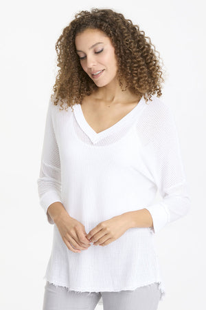 Wearables Mesh Fira Pullover in White. V neck mesh pullover with 3/4 sleeve and drop shoulder. Rib trim at neck and cuff with raw edge. Curved hem with raw edge. Relaxed fit._35102551769288