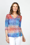 Top Ligne Bright Lines Grommet Crinkle Top.  Orange and Blue gradient mixed lines print.  V neck top with 3/4 sleeves.  Grommet and laces tie at lower left front.  Relaxed fit._t_34981280153800