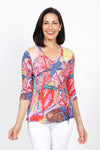 Top Ligne Chroma Art Grommets Top.  Brightly colored abstract art print.  V neck with banded neckline and 3/4 sleeve.  Grommet and lace-up detail on lower left side.  Relaxed fit._t_35333631901896
