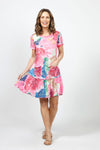 Top Ligne Starry Scene Dress in Multi. Large abstract floral print in shades of pink blue and green.  Crew neck short sleeve dress with inset flounce at bottom 3rd. Ruffle trim at neck and hem. Raw edges. Relaxed fit._t_35007917064392