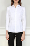 Hinson Wu jamie T Shirt Blouse in White.  Pointed collar button down with 3/4 sleeve. Hybrid fabrications: stretch poplin front and side panels. Stretch knit jersey sleeves and back. Shirt tail hem. Classic fit._t_34826926981320
