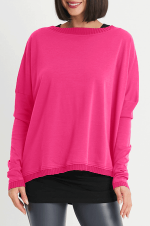 Planet Off the Shoulder T in Lipstick Pink. Pima cotton oversized tee with wide boat neck. Long sleeves. Dropped shoulders. Rib trim at neck, huff and hem. One size fits most._34472153841864