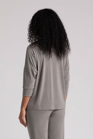 Sympli Slouch Sweatshirt in Melange Sand. Heathered medium beige fabric. Draped cowl neck top with dolman 3/4 sleeve with cuff. Drop shoulder. Relaxed fit._35103236128968