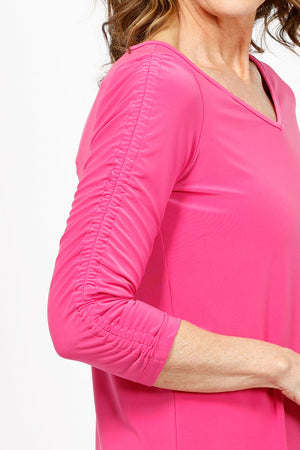Sympli Revelry Ruched Sleeve Top in Peony. V neck 3/4 sleeve with ruched detail down center sleeve. Side slits. A line shape. Relaxed fit._35242310664392