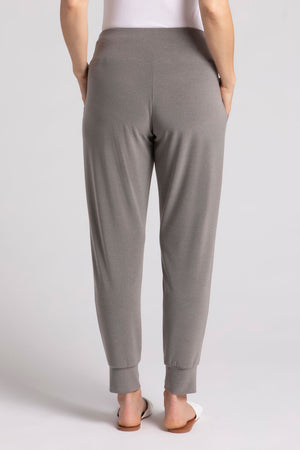 Sympli Motion Jogger in Melange Sand, a heathered grey beige.. Pull on pant with dropped waistband, front slash pockets. Slim leg with cuffed hem. 27" inseam._35103541821640