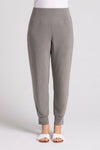 Sympli Motion Jogger in Melange Sand, a heathered grey beige.. Pull on pant with dropped waistband, front slash pockets. Slim leg with cuffed hem. 27" inseam._t_35103542018248