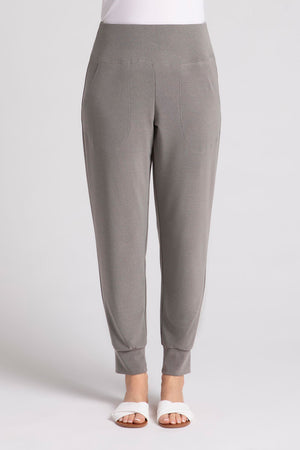 Sympli Motion Jogger in Melange Sand, a heathered grey beige.. Pull on pant with dropped waistband, front slash pockets. Slim leg with cuffed hem. 27" inseam._35103542018248