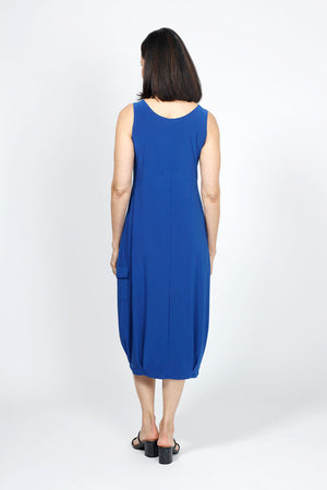 Sympli Nu Pleat Hem Tank Dress in Twilight Blue, a medium bright blue.. Scoop neck sleeveless dress. Defined waist with gathered bubble skirt with small pleats at hem. 2 front slash in seam pockets. Contour seaming. Single cargo pocket with flap on side. Relaxed fit._35033435439304