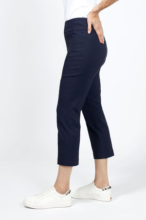 The Holland Ave Millennium Crop with Pocket in Navy. Techno stretch pull on pant with 2 front slash pockets. 2 1/2" waistband. Slim through leg. 26" inseam._34960221700296
