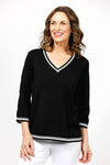 Metric Stripe Border Sweater in Black.  White double stripe at neck, cuff and hem.  V neck, 3/4 sleeve sweater.  Open weave knit down center of arm.  Relaxed fit._t_35066090193096