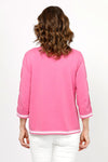Metric Stripe Border Sweater in Rose. White double stripe at neck, cuff and hem. V neck, 3/4 sleeve sweater. Open weave knit down center of arm. Relaxed fit._t_35066090127560