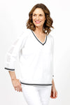 Metric Stripe Border Sweater in White. Black double stripe at neck, cuff and hem. V neck, 3/4 sleeve sweater. Open weave knit down center of arm. Relaxed fit._t_35066090389704