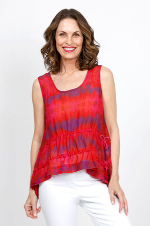 Organic Rags Watercolor Tank with Ruching in Magenta.  Purple pink and reddish tie dye watercolor print.  Scoop neck sleeveless tank. 2 tiers of  adjustable drawstrings with side ties: 1 below waist and the other above hem.  Swing shape.  Relaxed fit._35457453097160