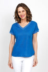 Elliott Lauren Metallic Linen Top in Blue.  Linen knit garment dyed.  V neck with dolman cap sleeve.  Silver metallic ribbed trim at neck and cuff.  Curved hem.  Side slits.  Relaxed fit._t_35419558183112