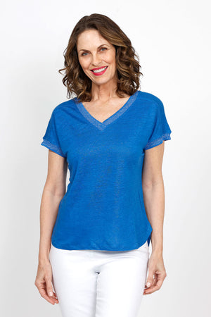 Elliott Lauren Metallic Linen Top in Blue.  Linen knit garment dyed.  V neck with dolman cap sleeve.  Silver metallic ribbed trim at neck and cuff.  Curved hem.  Side slits.  Relaxed fit._35419558183112