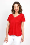Elliott Lauren Metallic Linen Top in Vermillion Red. Linen knit garment dyed. V neck with dolman cap sleeve. Silver metallic ribbed trim at neck and cuff. Curved hem. Side slits. Relaxed fit._t_35419557888200