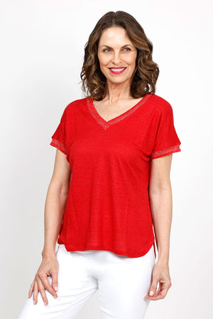 Elliott Lauren Metallic Linen Top in Vermillion Red. Linen knit garment dyed. V neck with dolman cap sleeve. Silver metallic ribbed trim at neck and cuff. Curved hem. Side slits. Relaxed fit._35419557888200