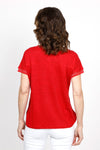Elliott Lauren Metallic Linen Top in Vermillion Red. Linen knit garment dyed. V neck with dolman cap sleeve. Silver metallic ribbed trim at neck and cuff. Curved hem. Side slits. Relaxed fit._t_35419557920968