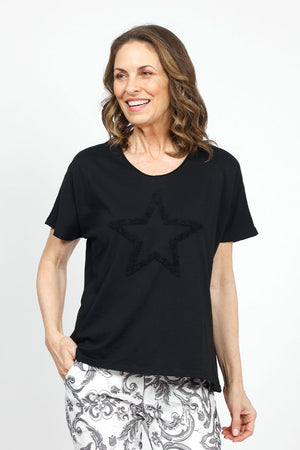 Organic Rags Fringe Star top in Hot Black. V neck short sleeve top with textured fringe outline of star in front. Rolled edge at neckline. Relaxed fit._34910593384648