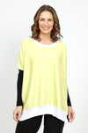 Planet Color Block Oversized Crew Sweater in Citron with black and white colorblocking.  Crew neck oversized sweater with citron body.  Drop shoulder.  Long black sleeves.  White trim at neckline and hem.  Side slits.  Inverted u-shaped hem.  One size fits many._t_34933022425288