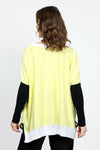 Planet Color Block Oversized Crew Sweater in Citron with black and white colorblocking. Crew neck oversized sweater with citron body. Drop shoulder. Long black sleeves. White trim at neckline and hem. Side slits. Inverted u-shaped hem. One size fits many._t_34933022458056