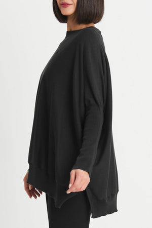 Planet Pima Oversized Crew Sweater in Black. Crew neck sweater with long ribbed sleeves. Rib trim at neck and hem. Side slits. Oversized fit. One sizes fits many._34306610036936