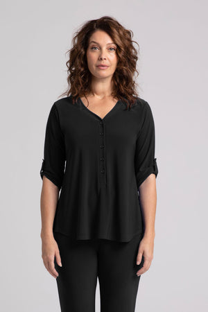 Sympli Convoy Henley in Black.  V neck with 5 button placket.  3/4 sleeve with button tab closure in satin crepe.  Back yoke with inverted pleat below.  Curved hem. Side slits. Relaxed fit._35035498938568