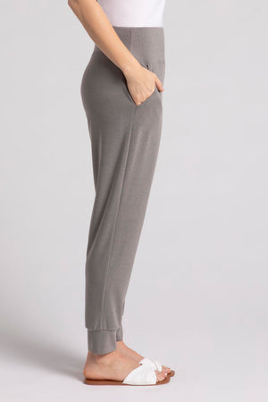Sympli Motion Jogger in Melange Sand, a heathered grey beige.. Pull on pant with dropped waistband, front slash pockets. Slim leg with cuffed hem. 27" inseam._35103541330120