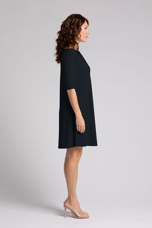 Sympli Nu Trapeze Elbow Sleeve Dress in Black. Boat neck elbow sleeve a line dress in 2 in seam pockets. Relaxed fit._34817868464328