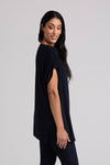Sympli Revelry Ruched Shoulder Tunic in Navy. Crew neck dolman short sleeve top with ruched shoulder. Side slits. Tunic length. Relaxed fit._t_35035549794504