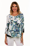 Lemon Grass Geometric Reversible Top.  Blue lime and white abstract splash print with black square line print.  Reverses to lime and white dot print.Round neck with 3/4 sleeve.  Mesh inset at one side of neck and other side of hem.  3/4 sleeve with mesh inset at cuff.  Relaxed fit._t_35061760753864