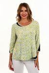 Lemon Grass Geometric Reversible Top. Blue lime and white abstract splash print with black square line print. Reverses to lime and white dot print.Round neck with 3/4 sleeve. Mesh inset at one side of neck and other side of hem. 3/4 sleeve with mesh inset at cuff. Relaxed fit._t_35061760721096