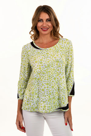 Lemon Grass Geometric Reversible Top. Blue lime and white abstract splash print with black square line print. Reverses to lime and white dot print.Round neck with 3/4 sleeve. Mesh inset at one side of neck and other side of hem. 3/4 sleeve with mesh inset at cuff. Relaxed fit._35061760721096