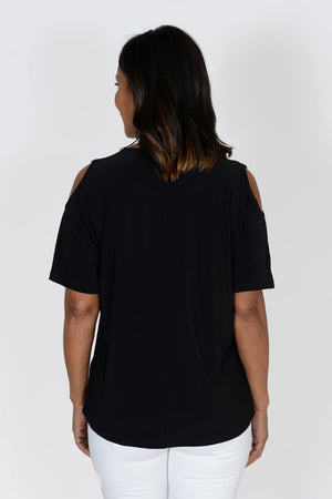 O.U.R.S. Cold Shoulder Top in Black. Crew neck short sleeve top with cut out shoulderts. Curved hem. Relaxed fit._33951254806728