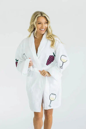 Unwind with the luxurious On Cloud Wine Terry Robe! Made from 100% cotton, this plush bathrobe is decorated in whimsical vino inspired illustrations and features two front patch pockets, a turned back shawl collar, and an adjustable self wrap belt for maximum comfort. _33553063805128
