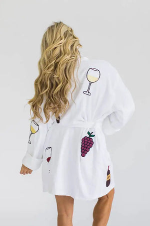 Unwind with the luxurious On Cloud Wine Terry Robe! Made from 100% cotton, this plush bathrobe is decorated in whimsical vino inspired illustrations and features two front patch pockets, a turned back shawl collar, and an adjustable self wrap belt for maximum comfort. _33553063903432