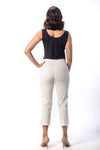 Holland Ave Susan Denim Crop Pant in White. Pull on hidden waistband pant with faux zipper flap. Snug through hip falls straight to hem. Side slits. 25" inseam._t_13297494917229