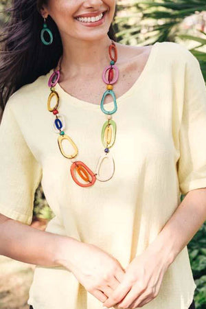 Organic Tagua Emily Necklace adjustable 32 inch to 40 inch long necklace with multi colored oblong tagua nut pieces separated by small beads on a cord _33102948958408