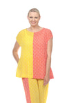 Terra Wave Print Duo Top in Orange/Yellow. Tee shirt style with crew neck and dolman cap sleeve. Complementary colors split down the middle front and back._t_33963616141512