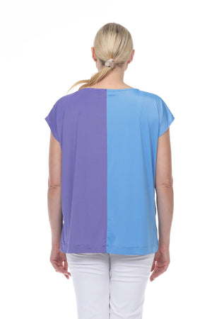 Terra Cap Sleeve Duo Top. Crew neck cap sleeve tee in Blue/Ocean. Top is split down the middle front and back and color-blocked in 2 complementary shades. Side slits. High low hem. Relaxed fit._33977935462600